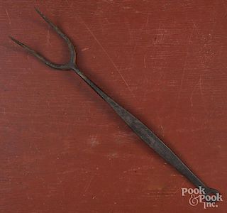 Wrought iron long-handled fork, 19th c., stamped J. V. Lovett, 15'' l.