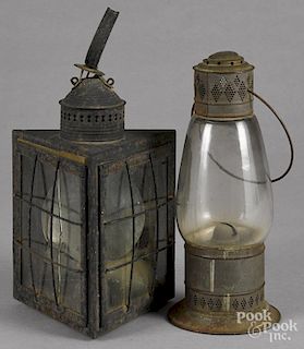 Tin carry lantern, 19th c., 13'' h., together with another tin lantern, 15'' h.