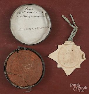 Unusual large William Penn wax seal, dated 1699, 4'' l., together with an embossed paper seal