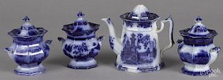 Flow blue Pelew coffee pot, 19th c., 8 1/2'' h., together with three covered sugars.