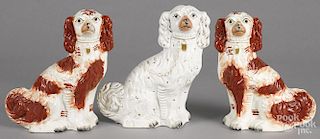 Pair of Staffordshire spaniels, 19th c., 12'' h., together with a single spaniel, 12 3/4'' h.