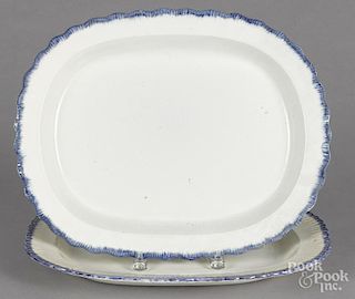 Two Leeds blue feather edge platters, 19th c., 13 3/4'' l., 17'' w.