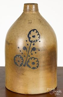 Two-gallon stoneware jug, 19th c., with cobalt floral decoration, 14 1/4'' h.