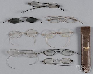 Eight early wire rim glasses, 19th c., together with a case