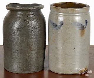 Two stoneware jars, 19th c., with cobalt floral decoration, 10'' h.