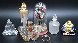 Group of Six Perfume Bottles, to include Baccarat Buddha figure; Schiaparelli; Voltigy butterfly, frosted (as is); Bryenne Paris; Benda; Paris Buddha,