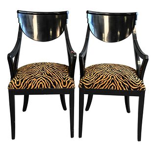 Pair of Black Lacquered Armchairs, having faux tiger seats, height 36 1/2 inches.