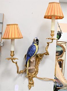 Pair of Brass Sconces, having porcelain parrots, electrified, height 25 inches.