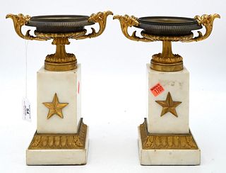 Pair of Gilt Bronze and Marble Compotes, resting on marble and bronze mounted plinth, one urn is loose from base but available,  height 10 inches.