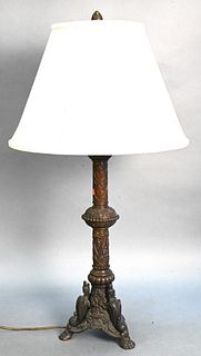 Large Bronze Lamp, having winged griffins on base, on hairy paw feet, height 37 1/2 inches.