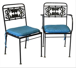 Set of Eight Iron Outdoor Chairs, to include two armchairs and two side chairs, height 32 1/2 inches.