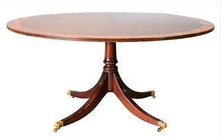 Round Mahogany Breakfast Tip Table, having banded inlaid top on pedestal base, height 28 1/2 inches, diameter 60 inches.
