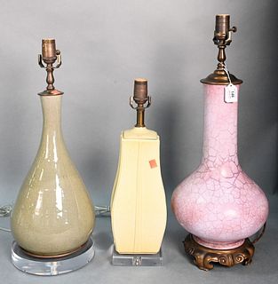 Group of Three Ceramic and Porcelain Lamps, to include celadon green crackle glaze pear shaped, yellow glaze with incised flowers along with a purple 
