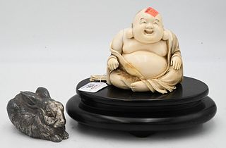 Two Piece Group, to include Chinese 19th century carved ivory Buddha height 6 inches, seated with crossed legs and fan, signed; along with a silver ra