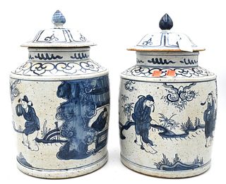 Pair of Chinese Porcelain Covered Jars, painted with figures, height 14 inches.