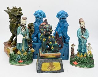 Group of Six Chinese Pieces, to include green and brown glazed terracotta foo dog, pair of blue glazed foo dogs, pair of glazed porcelain figures, alo