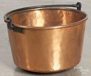 Copper apple butter kettle, 19th c., with an iron swing handle, 15 1/2'' h., 23 1/2'' dia.