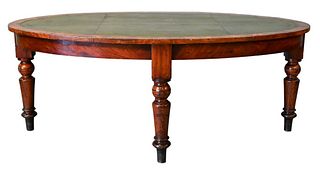 George IV Mahogany Oval Writing Table, having tooled leather top, height 30 inches, top 48" x 78".