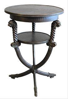 Bronze Round Table, having cat heads, height 33 inches, diameter 24 inches.