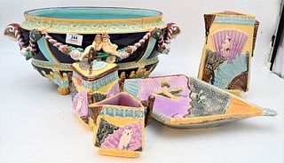 Group of Majolica, to include large figural jardiniere having putti on the sides with bust handles, along with a Fant owl tea set, jardiniere 9" x 14"