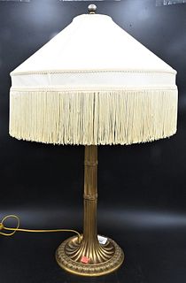 Gilt Bronze Candlestick Style Table Lamp, having silk shade, total height 29 inches.
