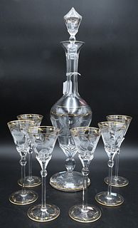 Seven Piece Moser Decanter Set, to include one tall decanter, height 21 inches; along with six stems, height 8 1/4 inches; all with etched flower moti