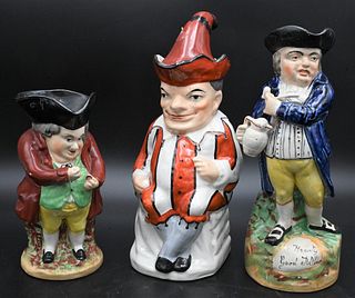 Group of Three Staffordshire Toby Jugs, to include jester with hat, hearty good fellow along with snuff tanker, tallest 11 1/2 inches.