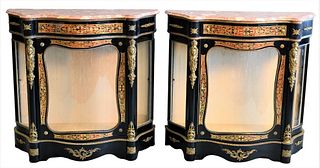 Pair of Trouvailles Inc. Cabinets, having shaped marble top with serpentine glass front and sides, height 40 inches width 42 inches, depth 16 inches.