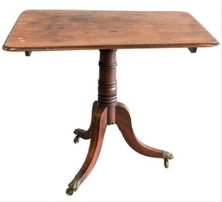 English Mahogany Breakfast Tip Table, on pedestal base, early 19th century, height 28 1/2 inches, top 26 1/2" x 36".