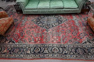 Oriental Carpet, worn, 10' 7" x 16' 9".