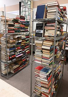 Two Racks of Books, topics include US Presidents, France, Greek myths, along with cook books.