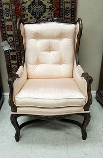 Carved Oak Pink Satin Upholstered Wing Back Chair. 