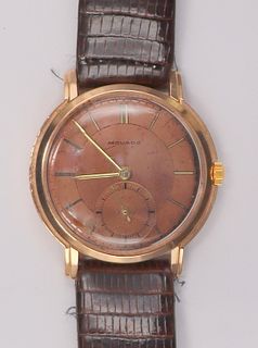 JEWELRY. Men's Vintage Movado 14kt Gold Watch.