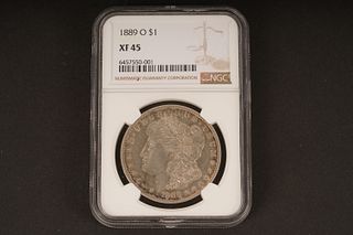 1889 O $1 XF 45. Graded by NGC in sealed coin