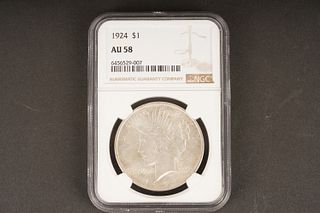 1924 $1 AU 58 Graded by NGC, in holder