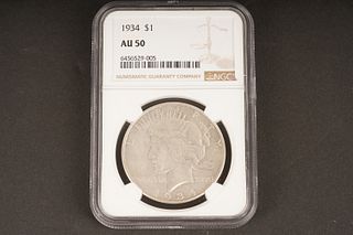 1934 $1 AU 50 Graded by NGC, in holder