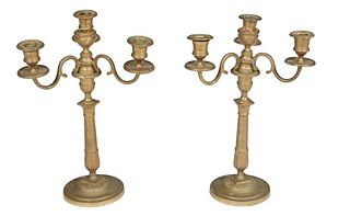 Pair of French Gilt Brass Four Light Convertible Candelabra, late 19th c., with a center raised candle cup flanked by three scrolled arms with like ca