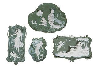 Four German Green Jasperware Bisque Plaques, early 20th c, possibly Schafer and Vater, with classical figural and animal decoration, Largest- H.- 8 3/
