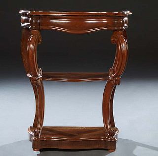 French Carved Cherry Console Table, c. 1870, the bowed serpentine rounded edge top over a frieze drawer, on scrolled supports to a center shelf on lik