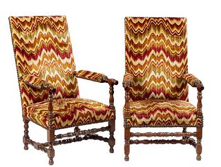 Pair of French Carved Oak Fauteuils a la Reine, 20th c. the high canted upholstered cushioned back flanked by upholstered arms over a like cushioned s