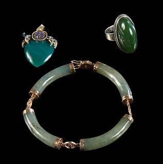Three Pieces of Jade Jewelry, consisting of a Mexican sterling cabochon oval jade ring, size 7; a Chinese enamel decorated heart pendant; and a 14K ye