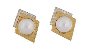 14K Yellow Gold Pearl and Diamond Earrings, with a central 15mm mabe pearl, beneath a top border of eleven seven point round diamonds, H.- 1 3/8 in., 