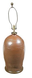Large Brown Earthenware Baluster Jar, early 20th c., the sides with ring turned decoration, now on a carved wooden base and wired as a lamp, H.- 24 in