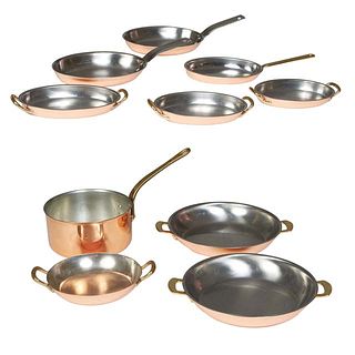 Group of Ten Copper Cooking Utensils, 20th c., consisting of a Culinox omelette pan with a brass handle; a sauce pan with a brass handle; 2 Serillo om
