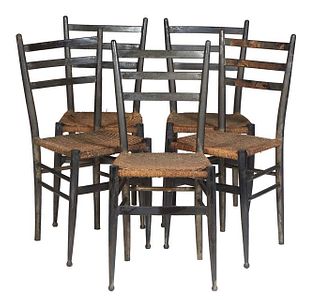 Set of Five Carved Beech Louisiana Plantation Style Dining Chairs, 19th c., the curved canted ladderbacks, over woven seats on turned cylindrical legs