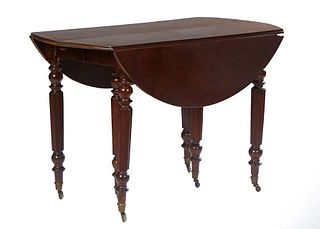 French Louis Philippe Carved Cherry Dropleaf Dining Table, 19th c., the stepped round top opening to accept leaves, on turned tapered reeded cylindric
