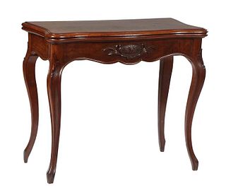 French Louis XV Style Carved Walnut Games Table, 19th c., the rounded edge and corner top opening to a gilt tooled green baize inset gaming surface, o