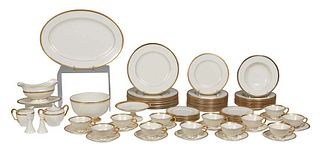 Seventy-Four Piece Lenox Porcelain Partial Dinner Service, 20th c., in the "Tuxedo" pattern, with gold rims and gold line decoration, consisting of 10