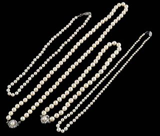 Group of Four Cultured Pearl Necklaces, one a graduated strand with a 14K white gold clasp, L.- 16 1/2 in.; one of 6mm pearls with a 14K white gold cl