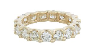 14K Yellow Gold Eternity Ring, with seventeen round prong set diamonds around the band, total diamond wt.- 3.12 cts., Size 6, with appraisaL.